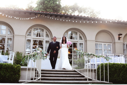 Father and Daughter walking down the stairs