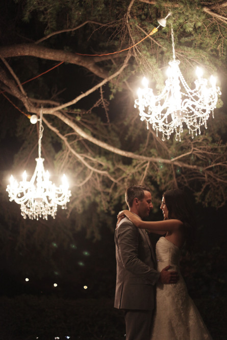 couple kissing under lights